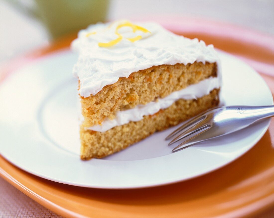 Slice of Double Layer Carrot Cake with Cream Cheese Frosting
