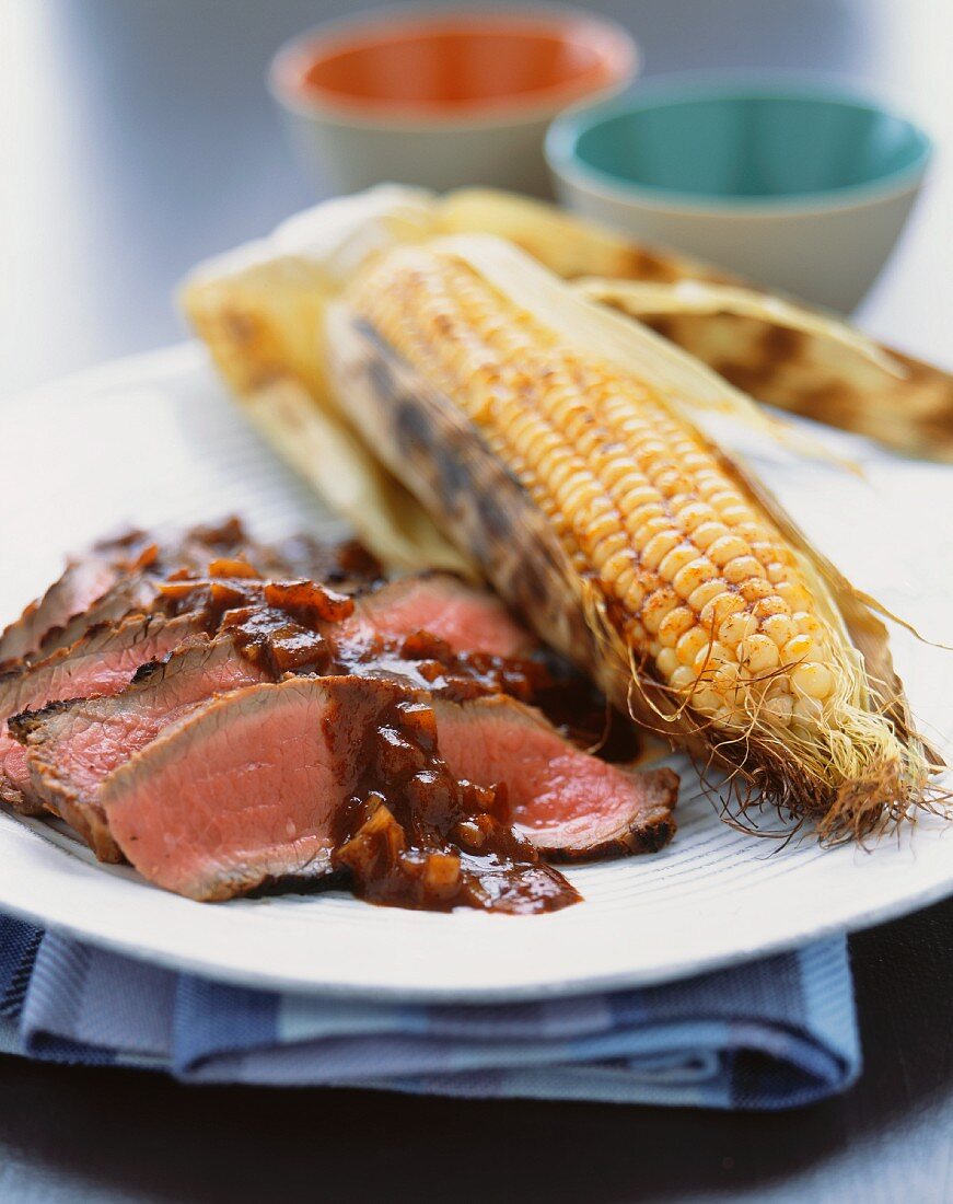 Sliced Beef Brisket with Gravy and Corn on the Cob