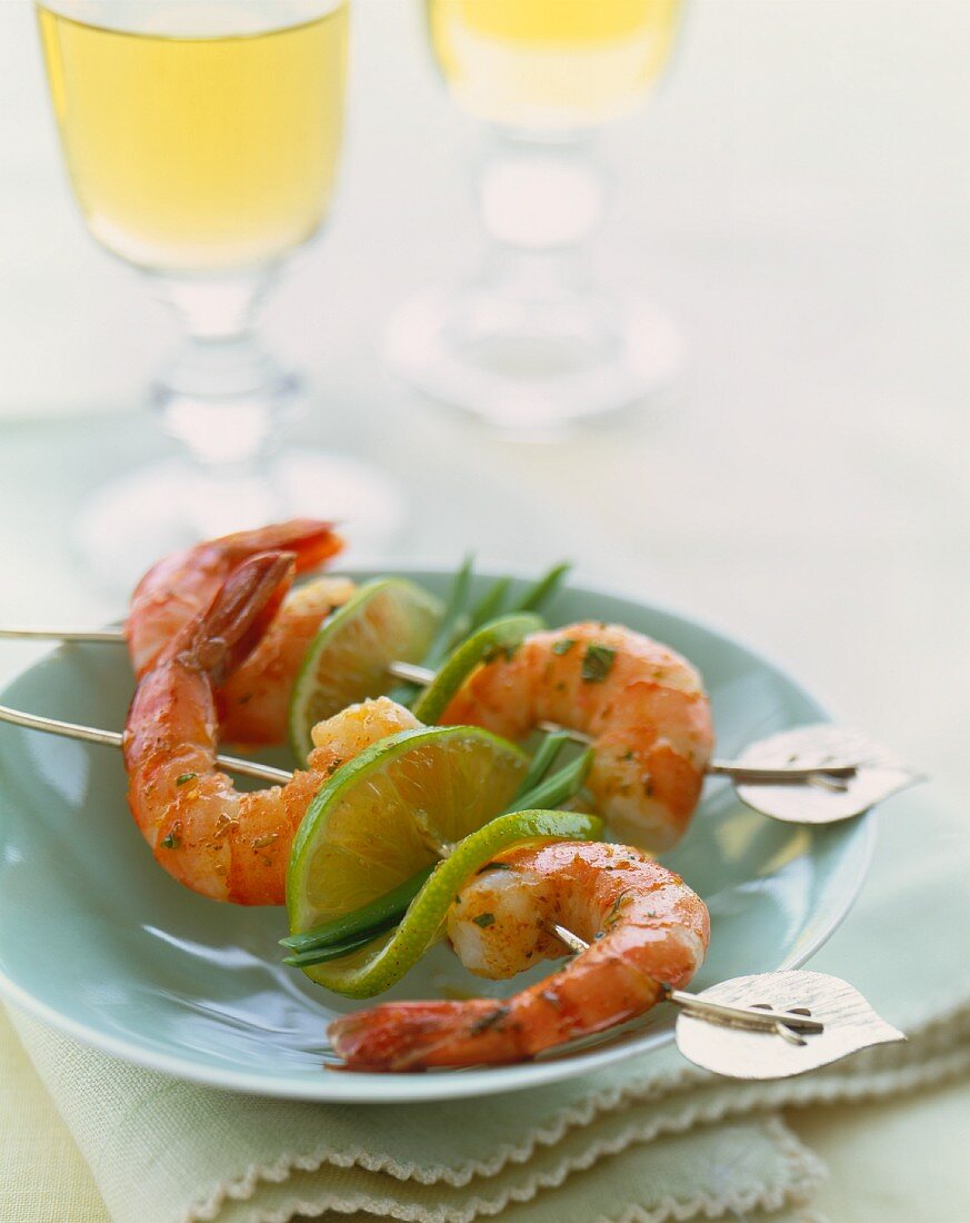 Two Shrimp and Lime Skewers on a Small Plate