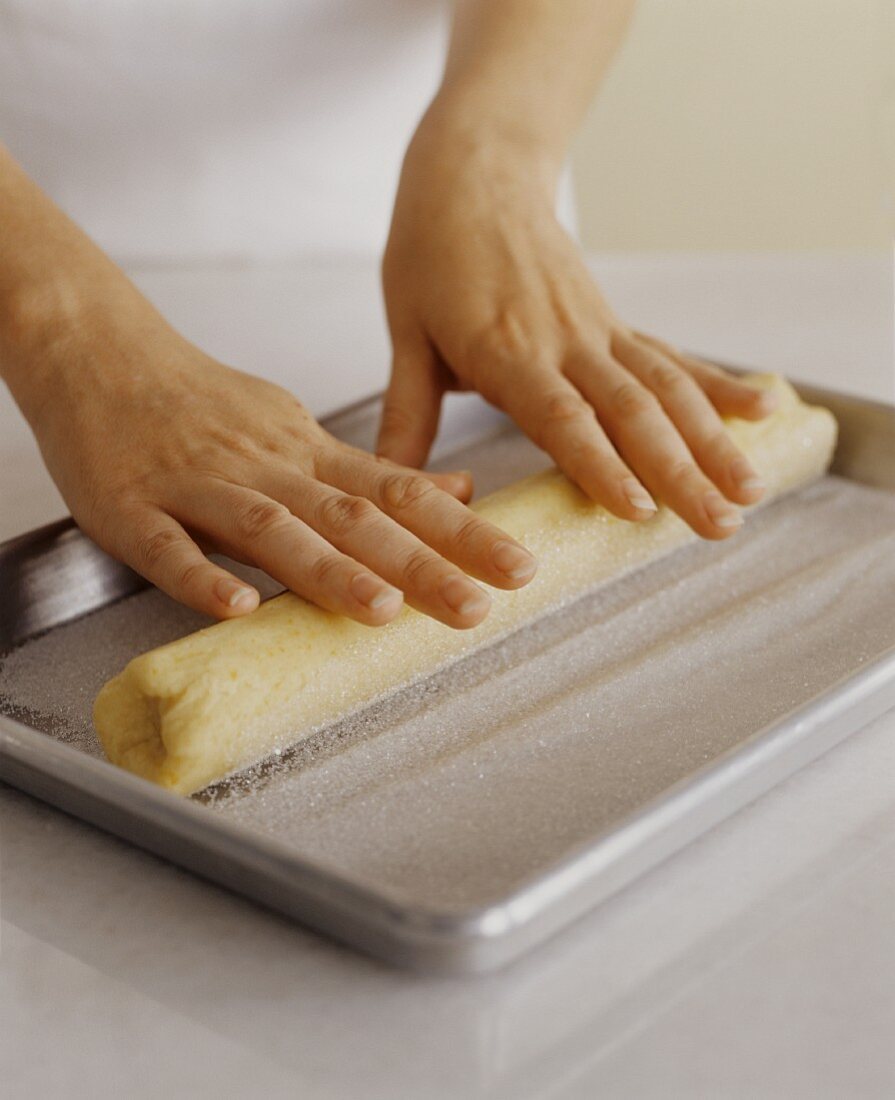 Rolling Dough in Granulated Sugar