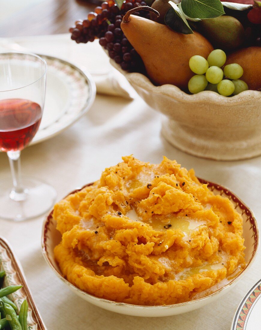 Mashed Sweet Potatoes with Butter in a Serving Bowl
