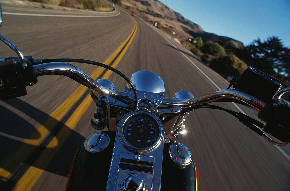 View over the handlebar of a Harley Davidson at the highway, USA, North America, America