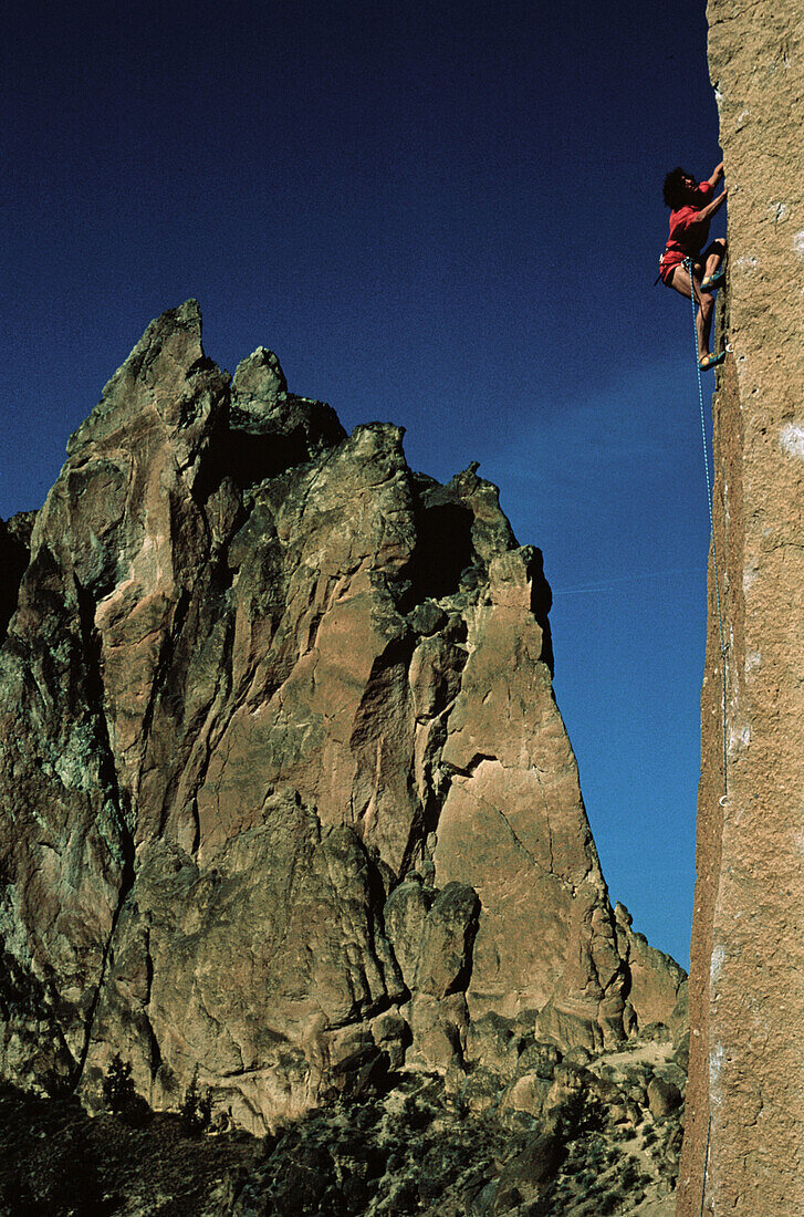 Freeclimbing, Stefan Glowacz climbing up a rockface