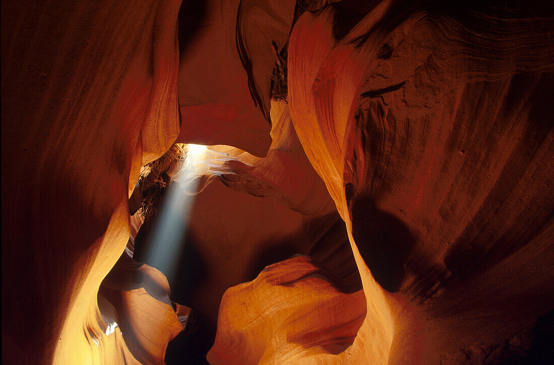 Ray of light falling into a cave, Antelope Canyon, Arizona, USA