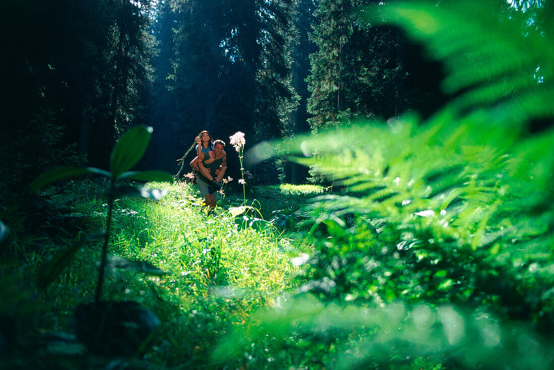 Young couple in the forest