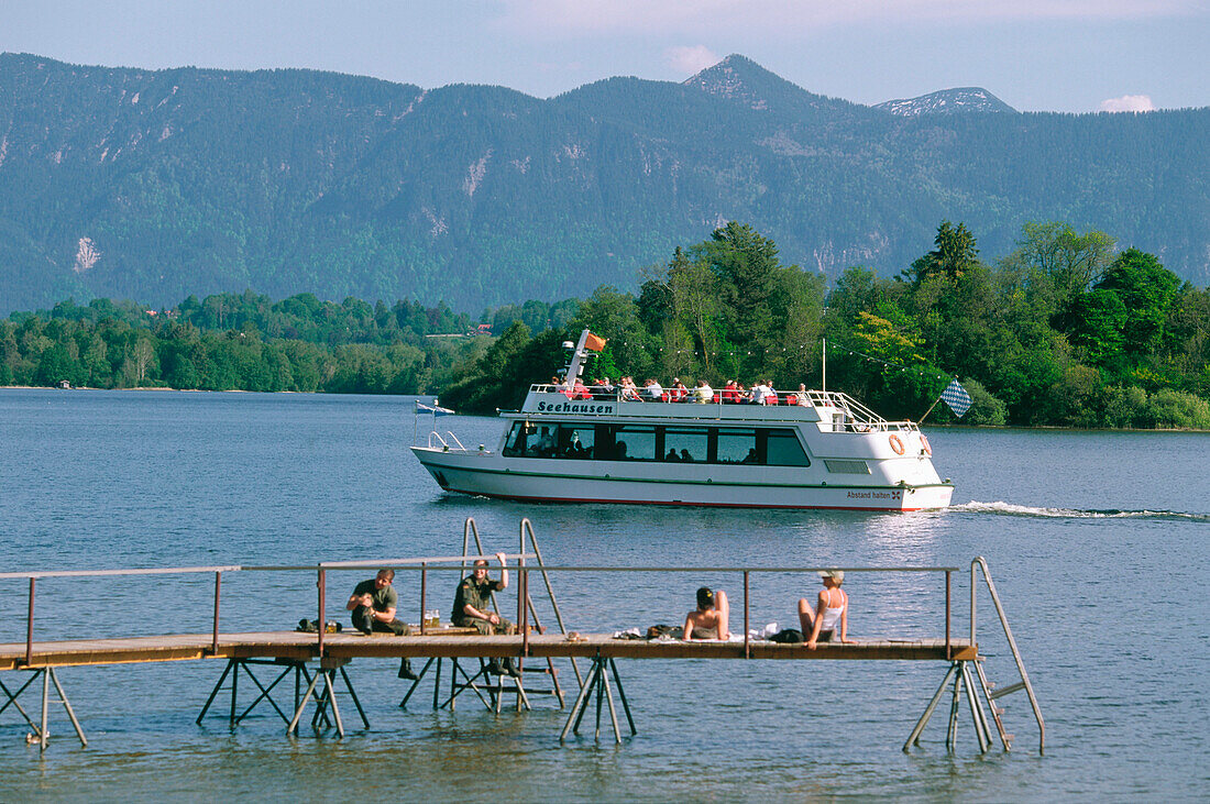 People on a jetty, Staffelsee, Murnau, Upper Bavaria, Germany