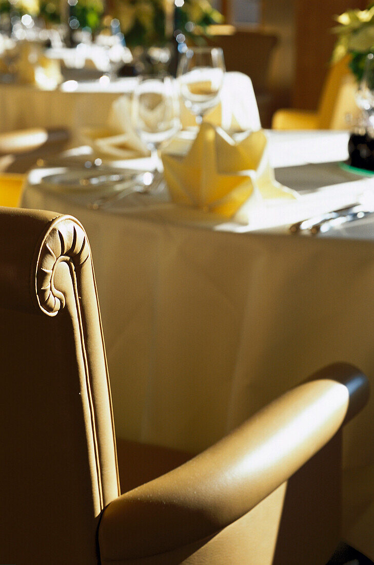 Glasses and place setting on table in Restaurant, Tegernsee, Bavaria, Germany