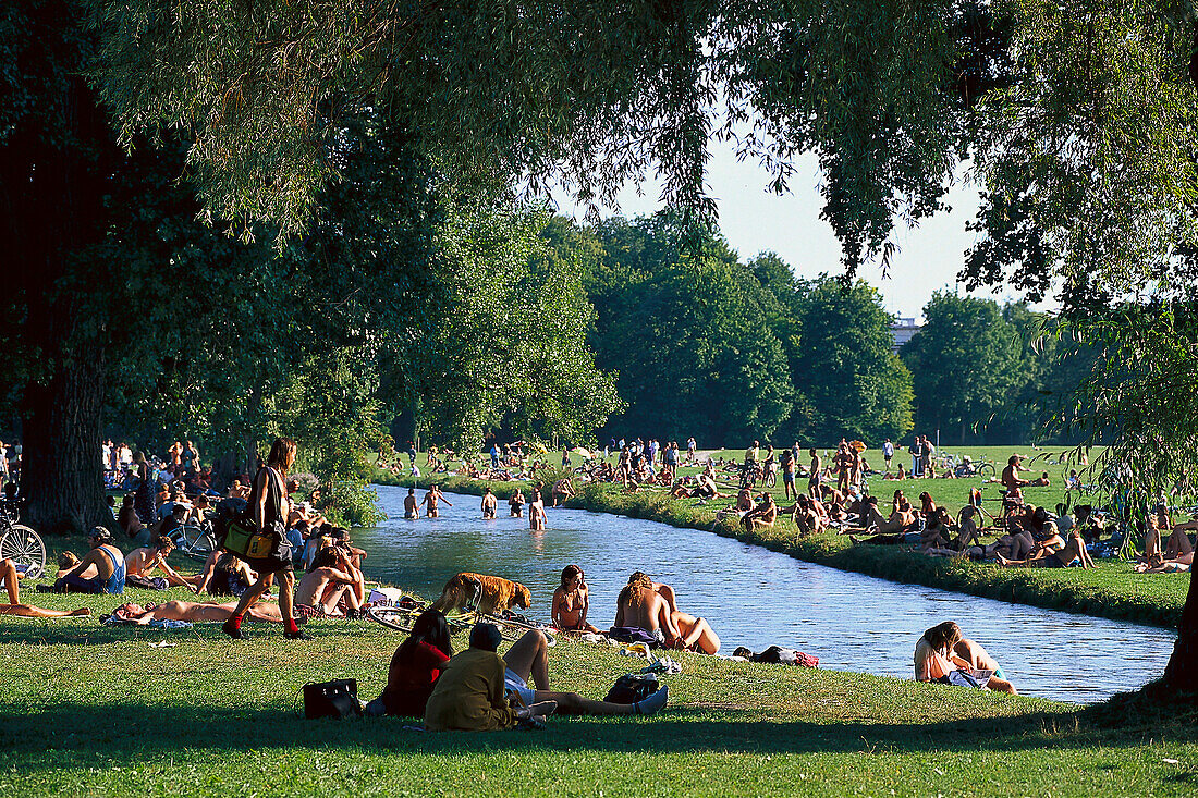 People relaxing in English Garden, Munich, Bavaria, Germany