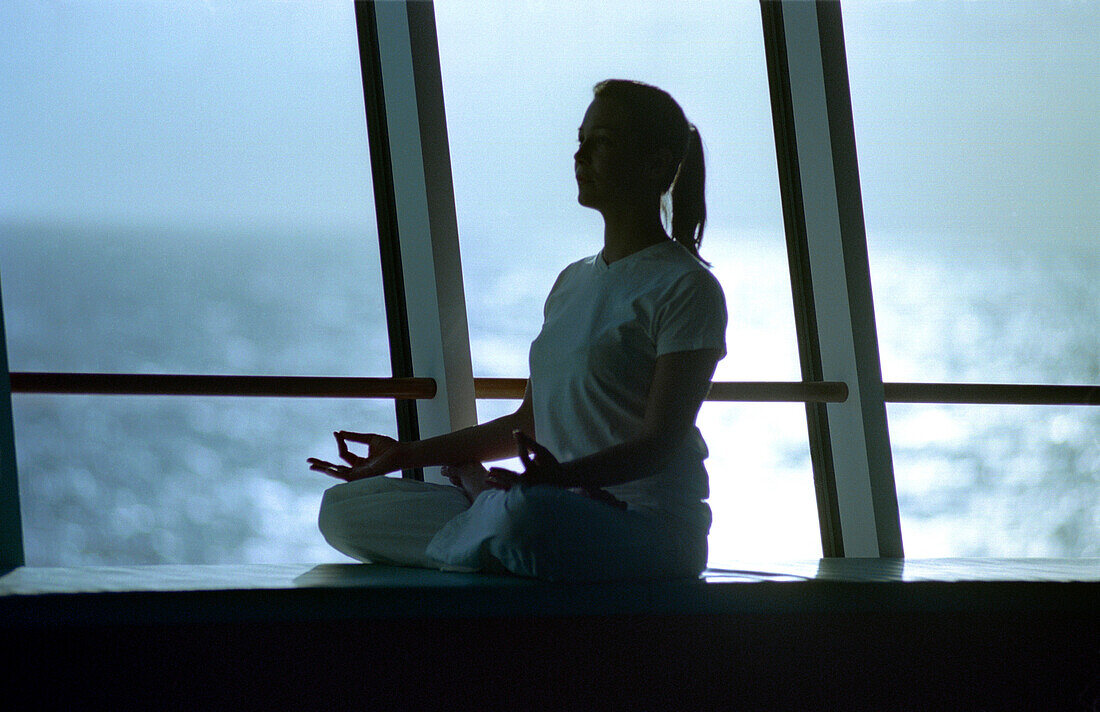 Woman doing Yoga, Cruise ship AIDA, Caribbean, America