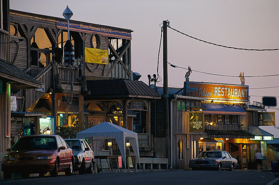 Buildings and cars at dusk, Cedar Key, Florida USA, America