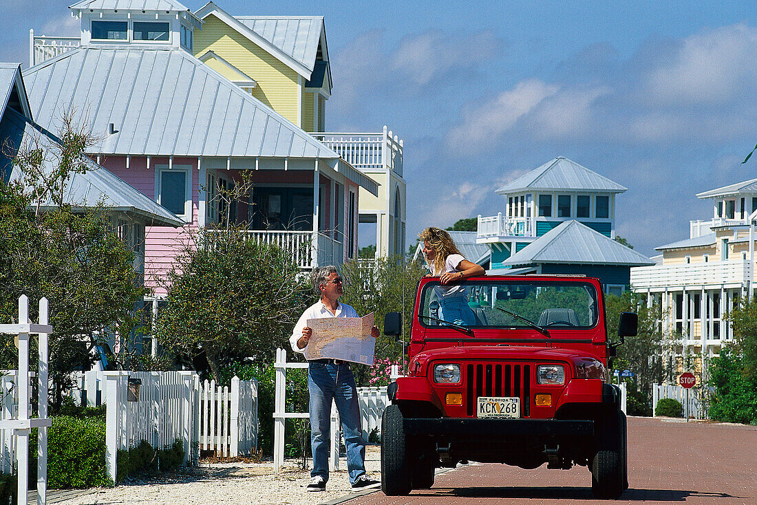Young people in a jeep, Santa Rosa Island Florida, USA