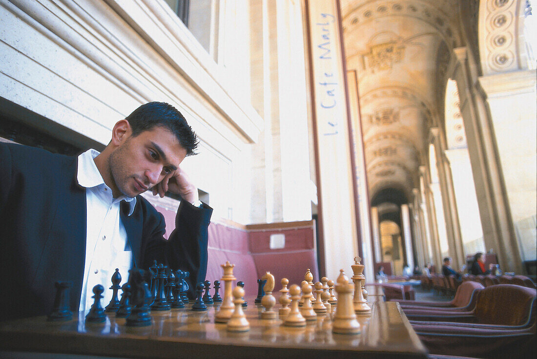 Chess player, Café Marly, Paris, France