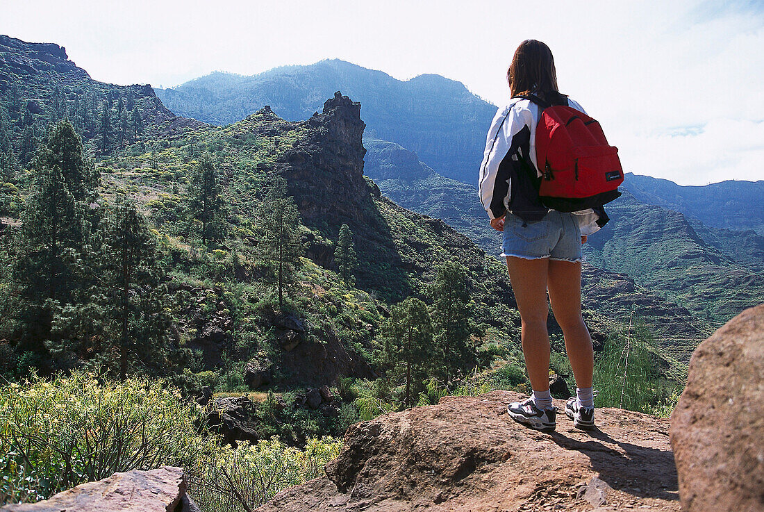 Woman on a hiking tour, from Mogan to Tejeda, Cruz de San Antonio, Gran Canaria, Canary Islands, Spain