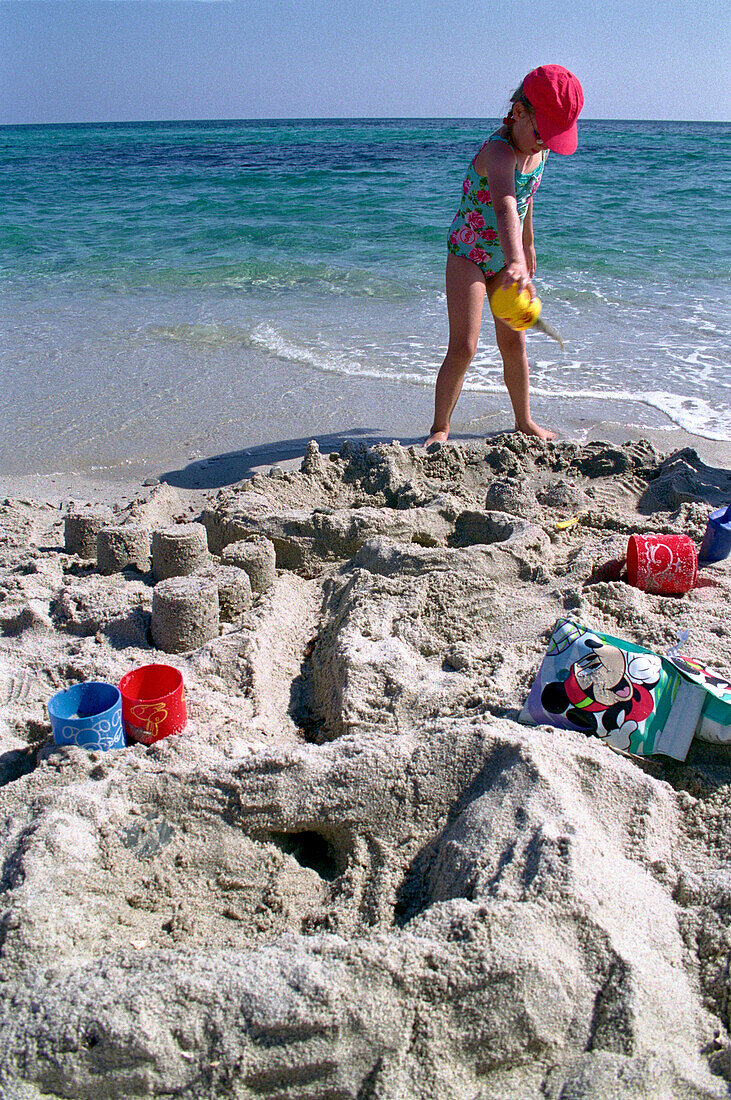 Child, Sand castle, Sardinia Italy