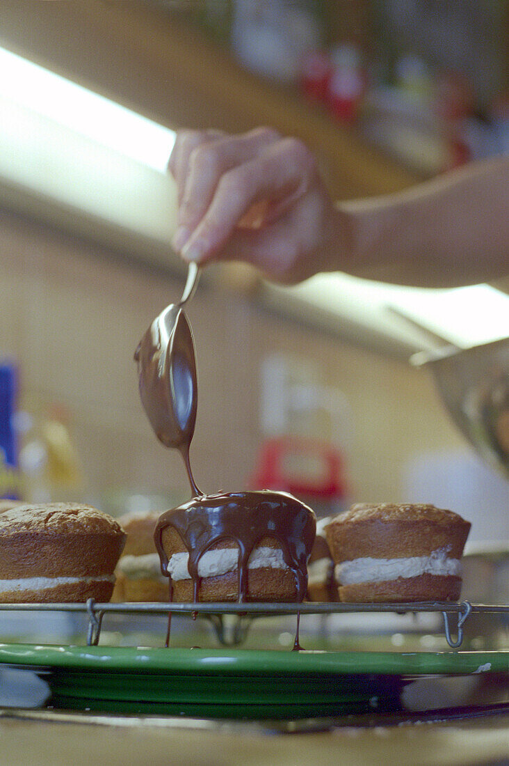 Muffin getting a chocolate coat