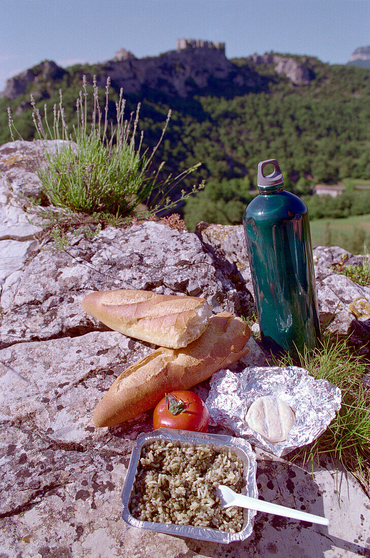 Bread, cheese and tomato on a rock, Drome, France, Europe
