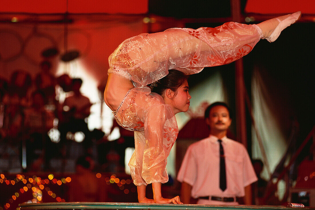 Acrobat at national circus, Saigon, Vietnam, Asia