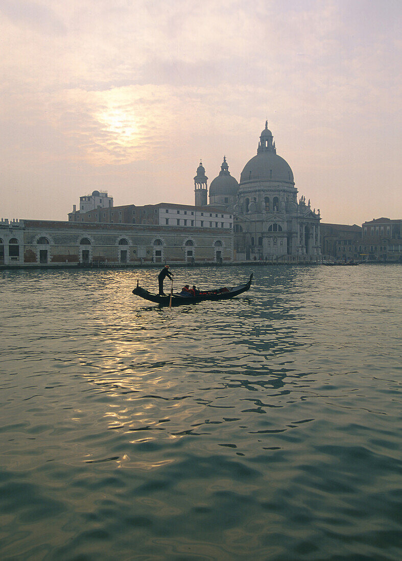 Gondola in front of Santa Maria della Salute in Venice, Italy
