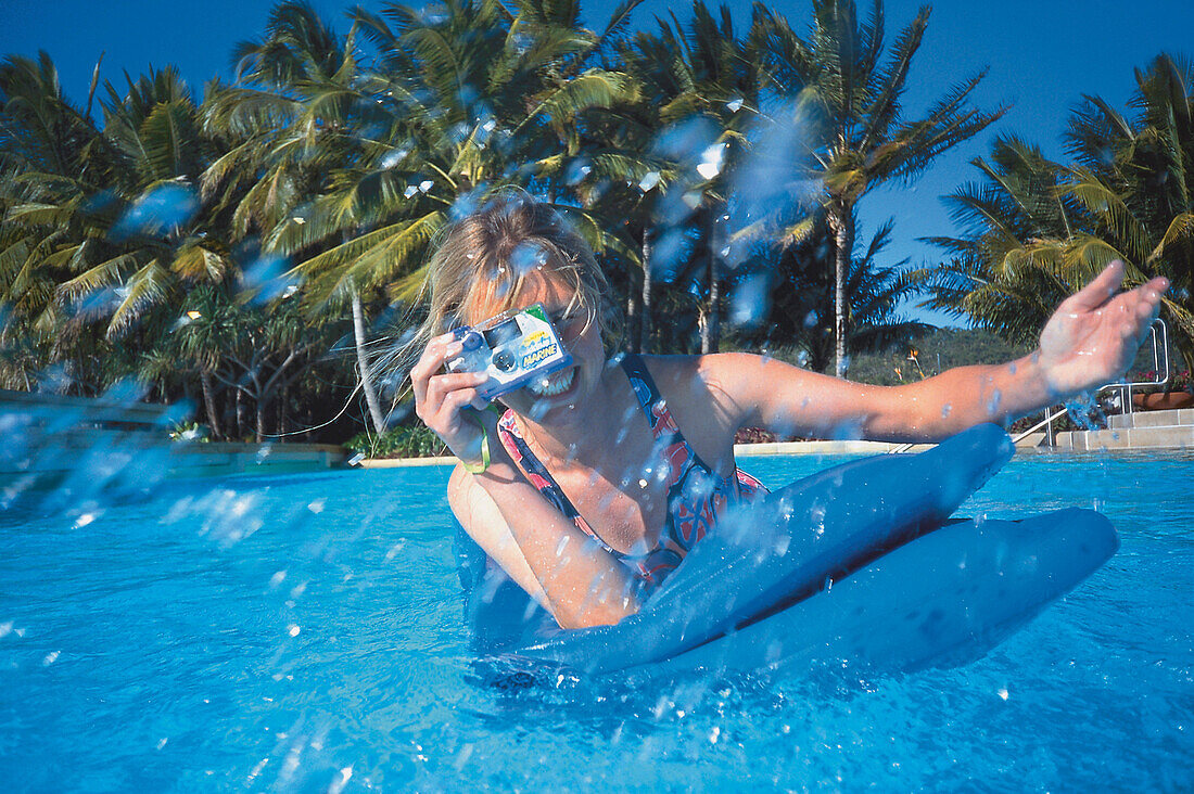 Fotografieren im Wasser, Swimmingpool, Hayman Island Queensland, Australien