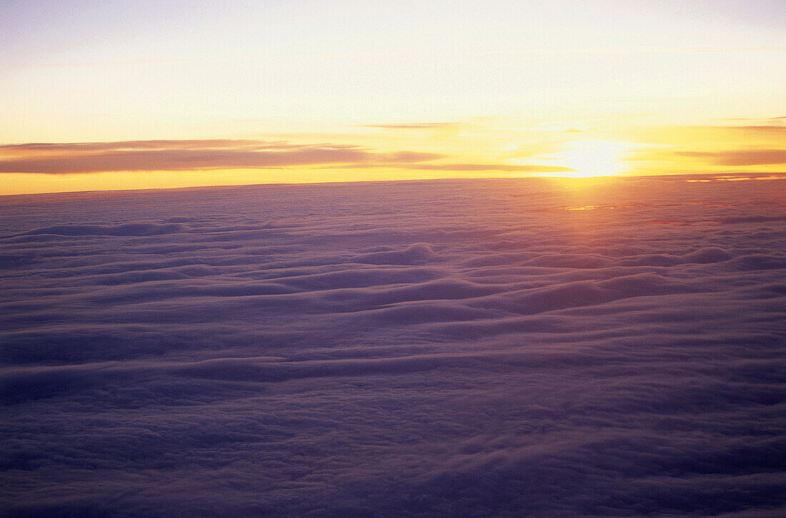 Sunrise over a sea of clouds