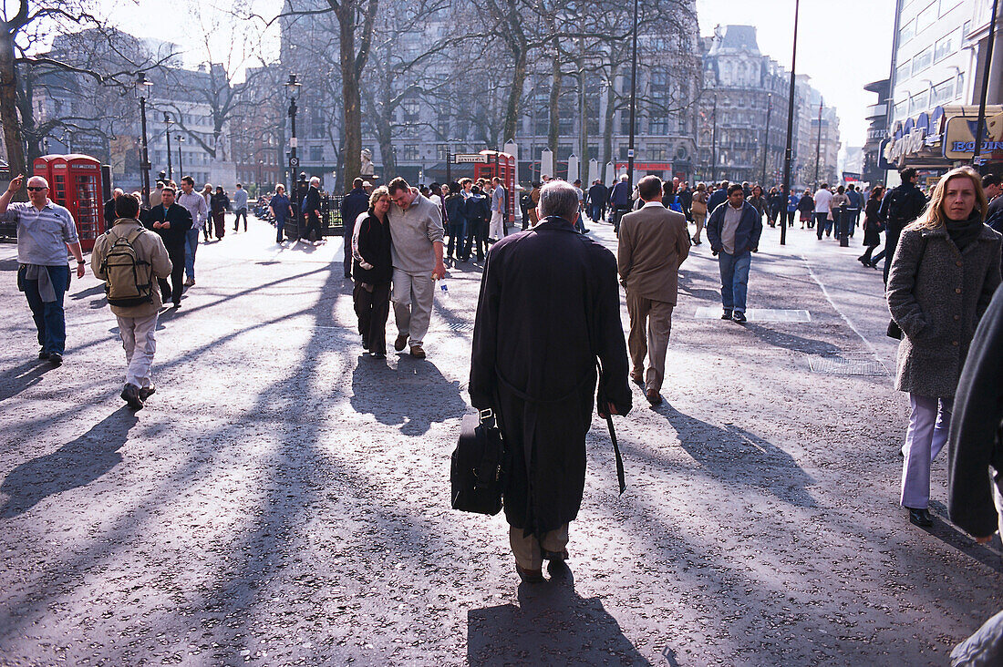 Passers-by in the Leicester Square in autmn, London, England, Great Britain