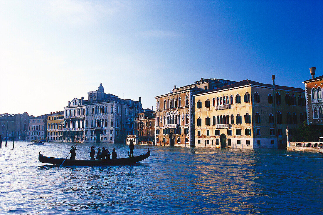 Traghetti going across Canale Grande, Venice, Veneto, Italy