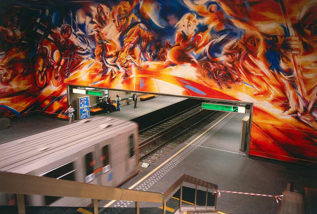 Extensive painting on a wall at a subway station, Brussels, Belgium