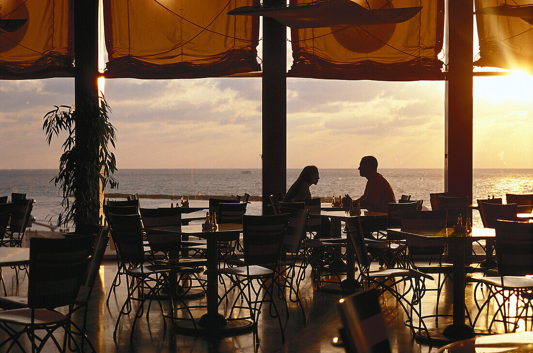 Couple at cafe of the King David hotel at sunset, Tel Aviv Israel, Middle East, Asia