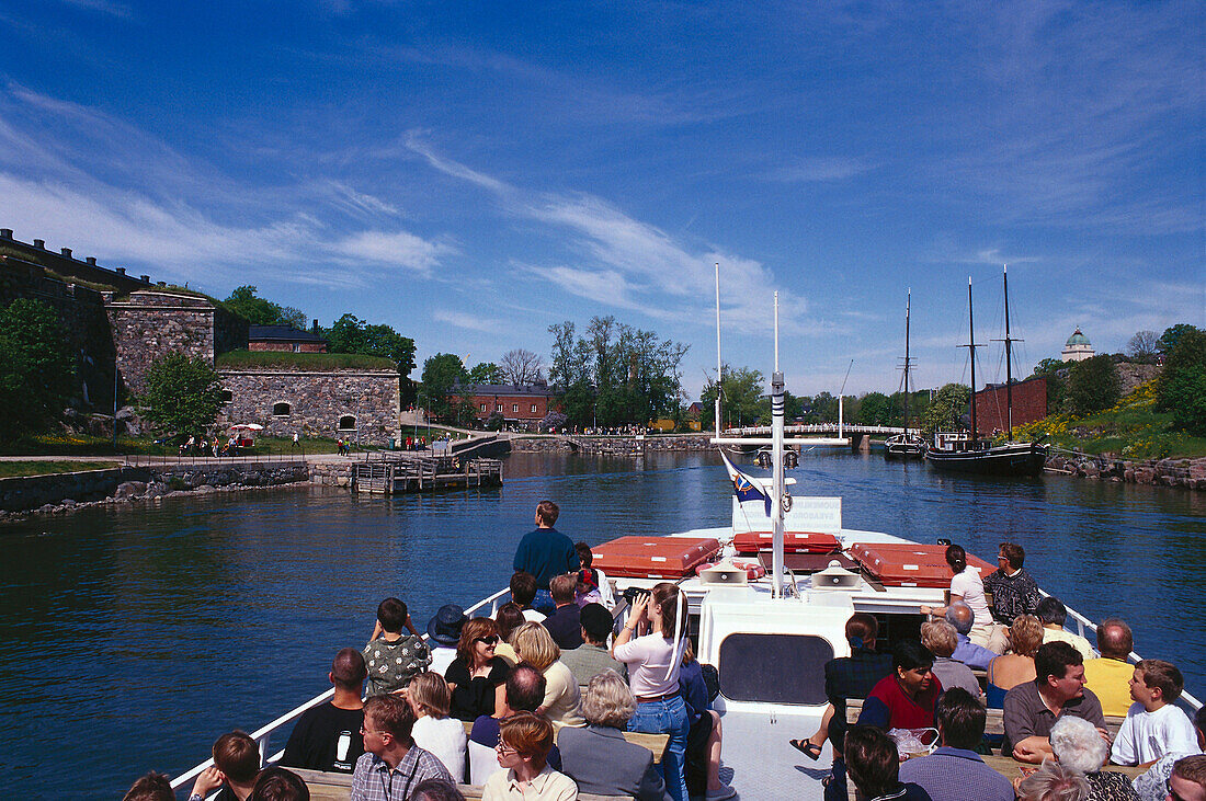 Passangers during the boat cruise to Soumenlinna, Helsinki, Finland