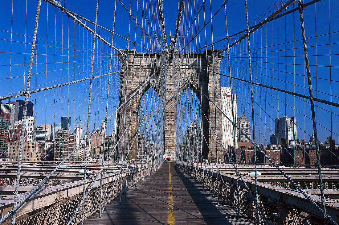 Brooklyn Bridge under blue sky, Manhattan, New York, USA, America