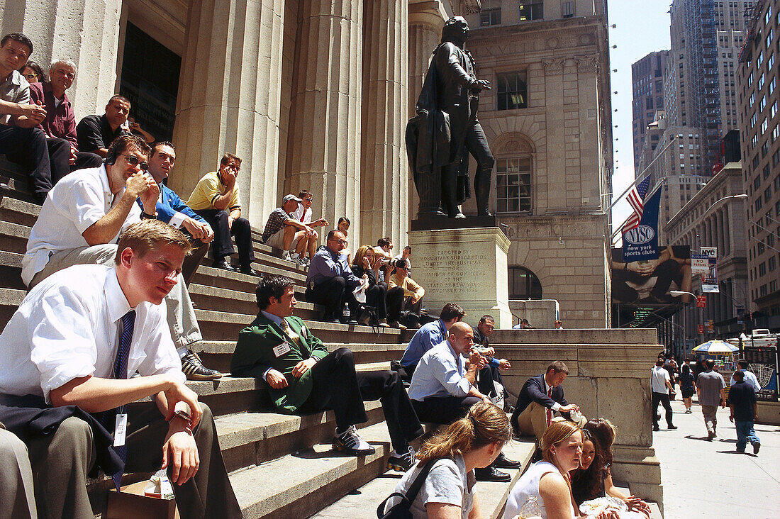 People sitting on steps in the sunlight, Wall Street, Financial District, Manhattan, New York, USA, America