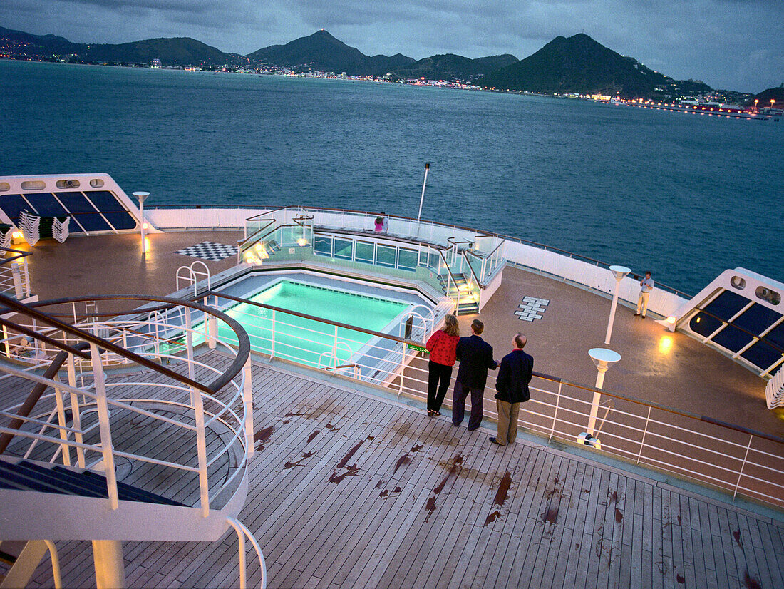 People on the quarterdeck looking towards the coast, Queen Mary 2, St. Maarten, Caribbean