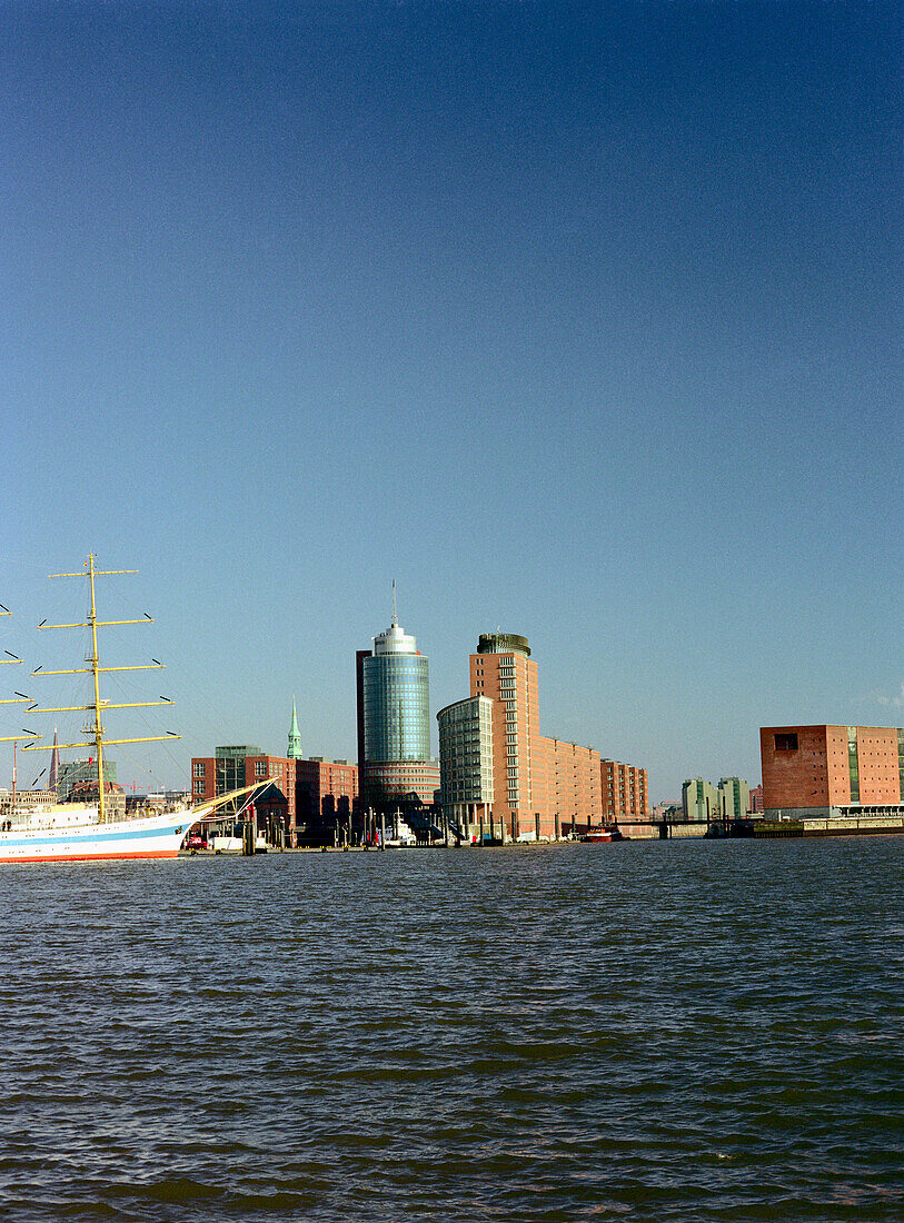 Sailer before Hanseatic Trade Center, Kehrwiederspitze, Hanseatic Trade Center, Kaispeicher A, Harbour City, Hamburg, Germany