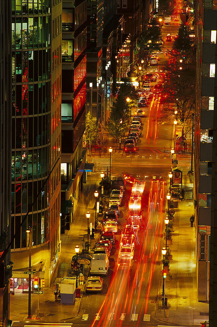 Cars on a street downtown in the evening, Business District, 17th Street, Philadelphia, Pennsylvania, USA, America