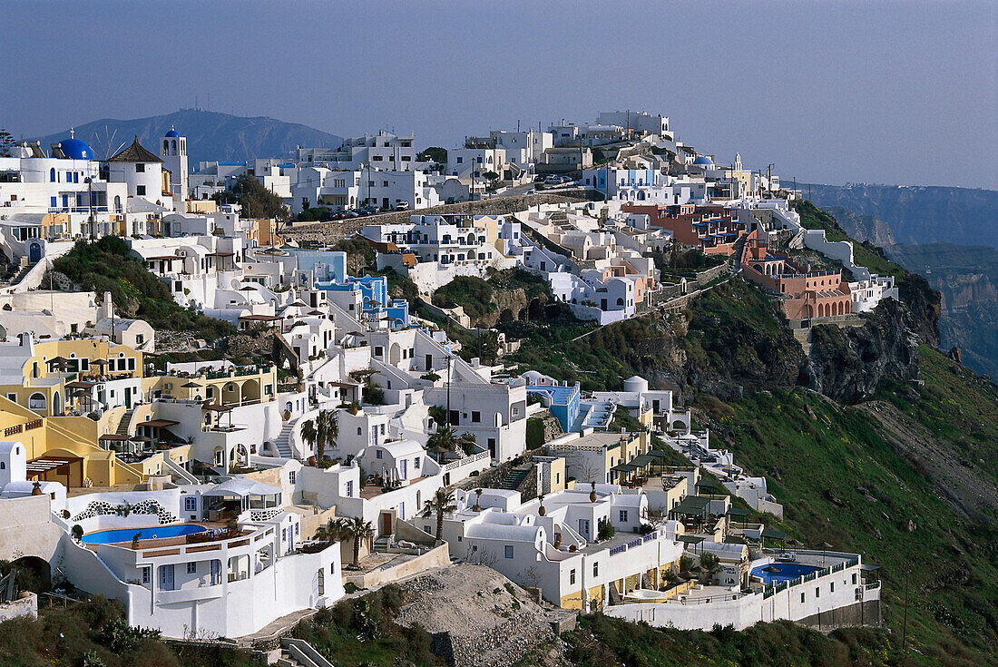 Houses at a mountainside in the sunlight, Fira, Santorin, Cyclades, Greece, Europe