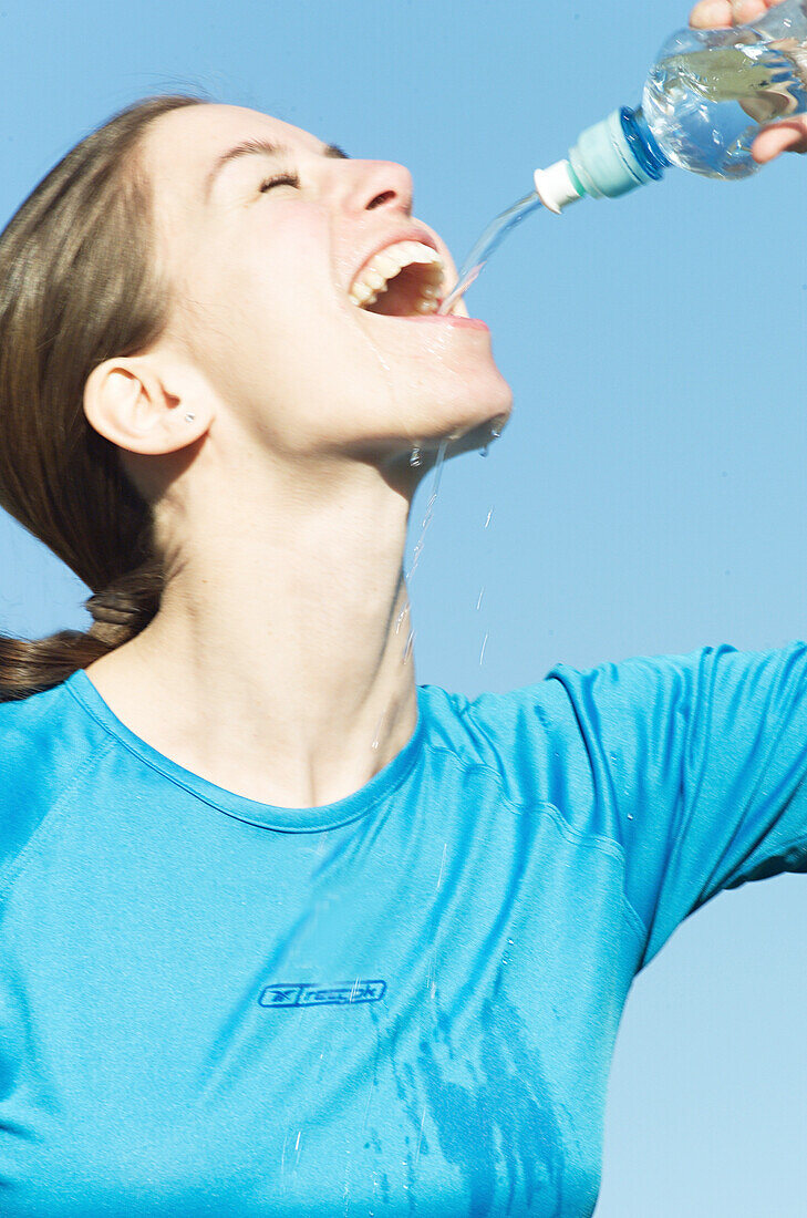 Woman drinking water, people drinking