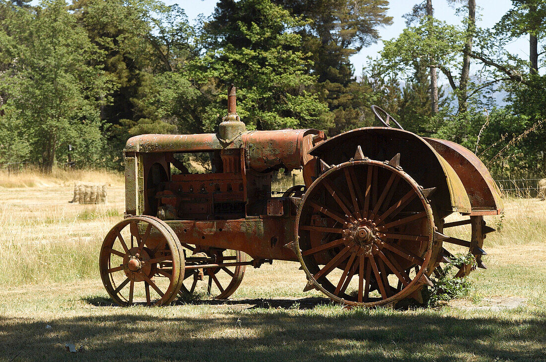 Old harvestmachine in newzealand, landscape automobile