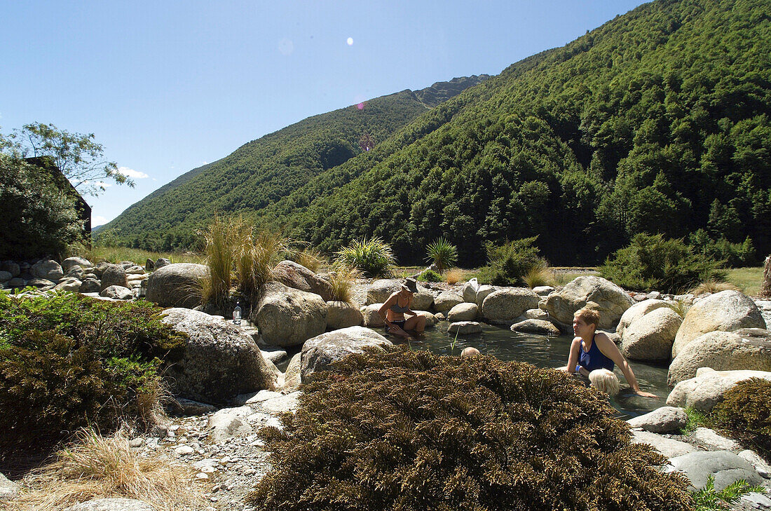 Hot springs in newzealand, people bathing