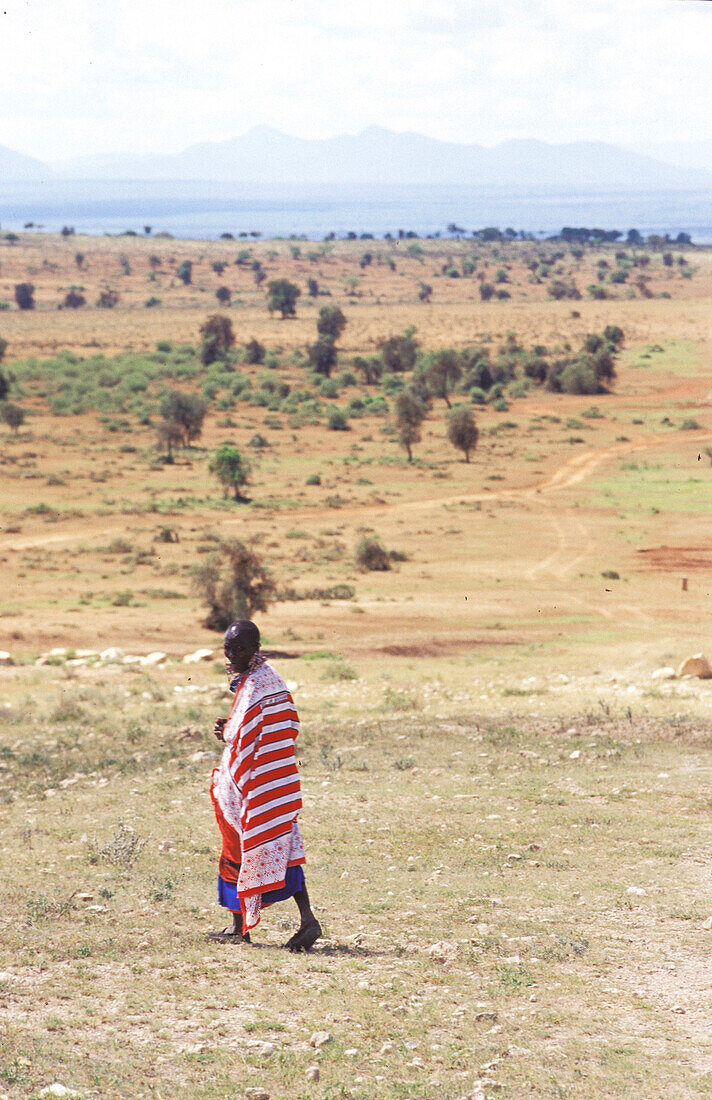 Woman walking through dessert, people walking woman