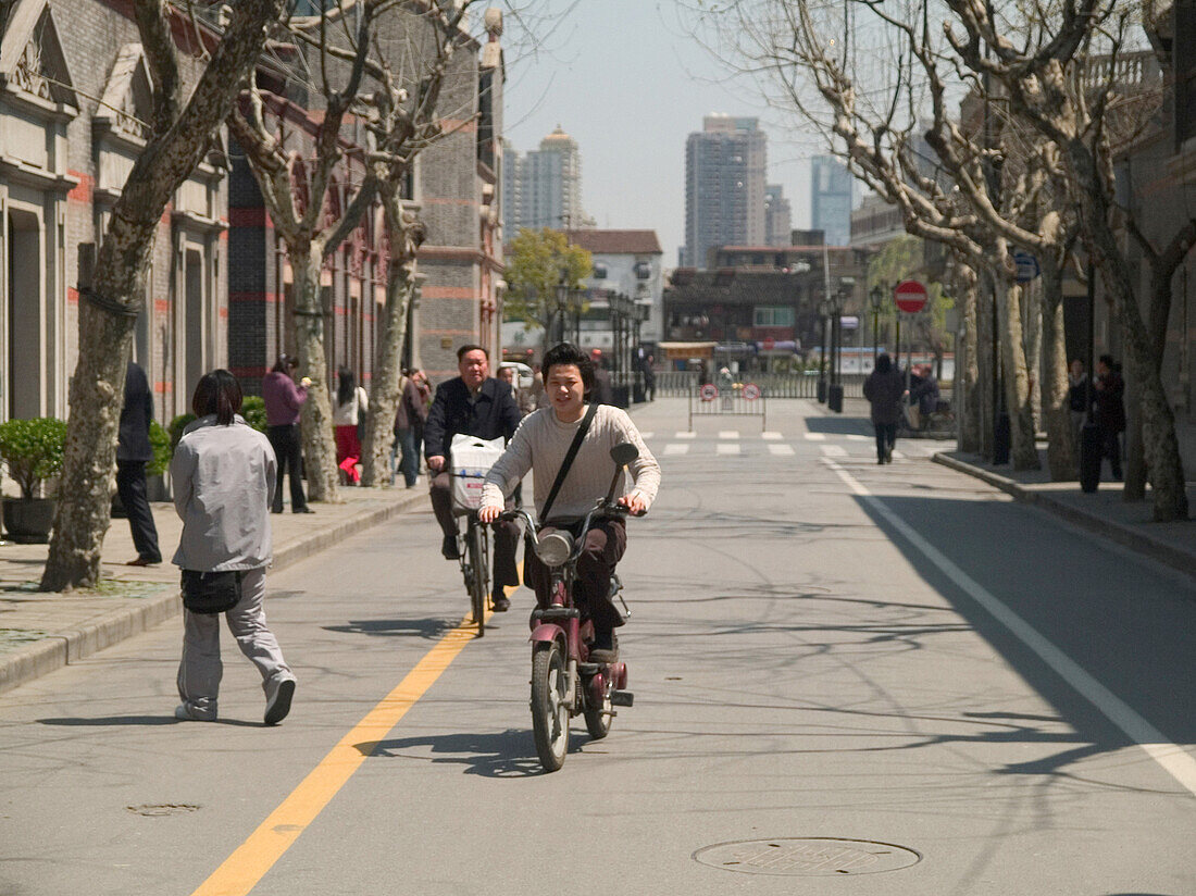 Man on a bike, Shanghai, China