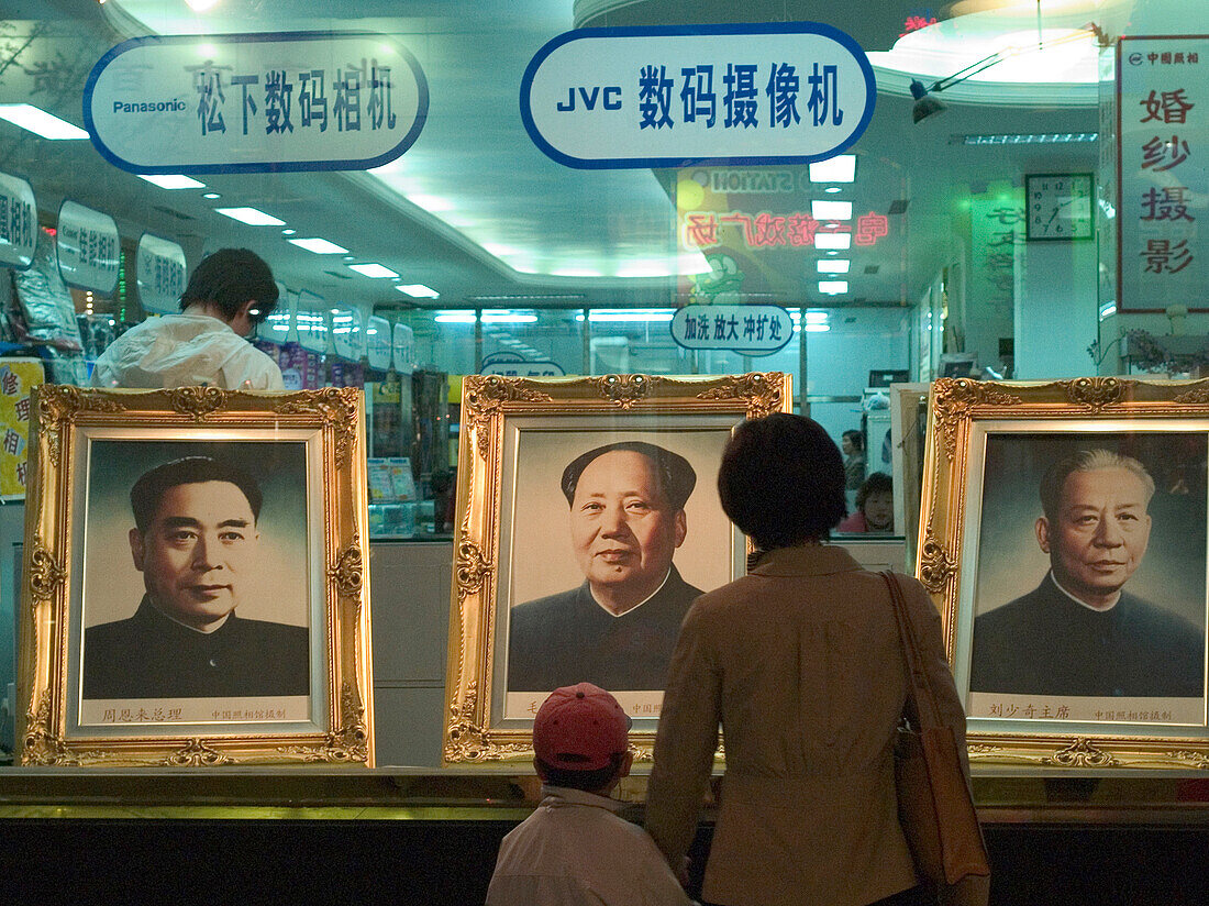 Woman and child in front of a shop window, Shanghai, China, Asia