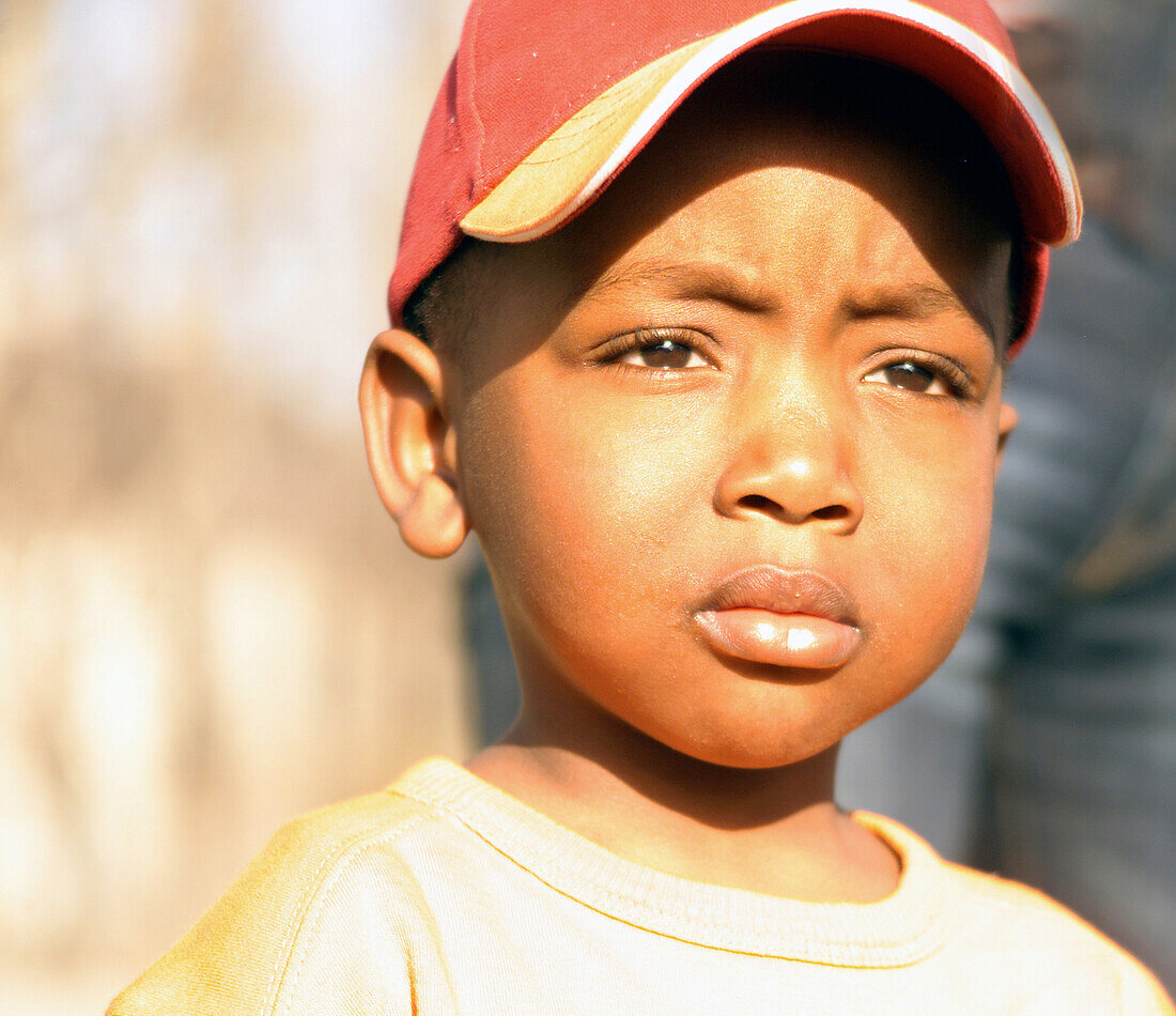 Boy with cap, people