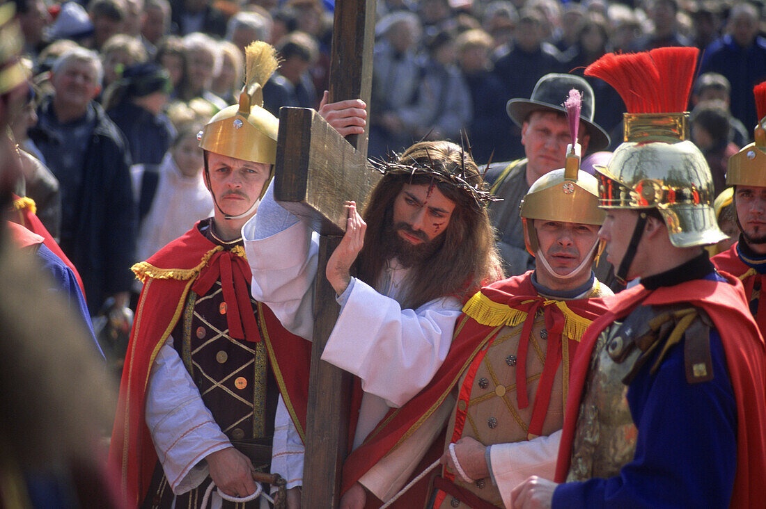 Jesus Christ played by a priest carrying the Cros, The Mystery of the passion of Christ Kalwaria Zebrzydowska, Cracow, Polen