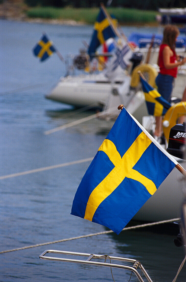 Swedish flags, Gruvbryggan harbour, Uto, Archipelago, Sweden