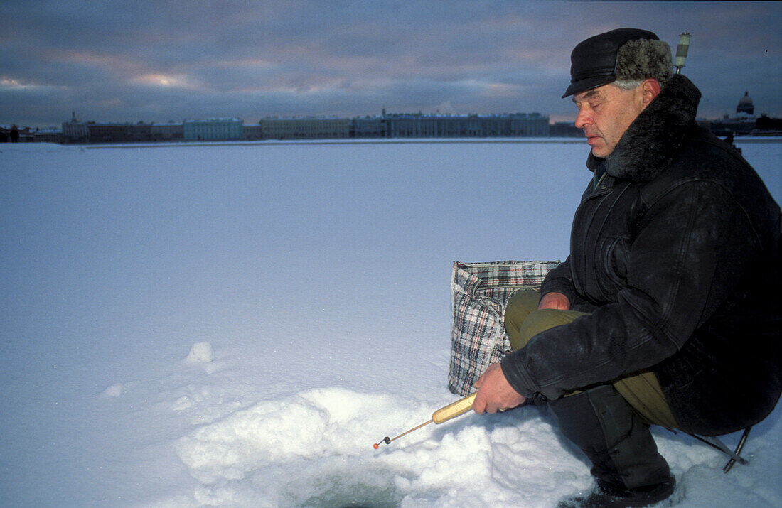 Ice fishing on the Neva river, St. Petersburg Russia