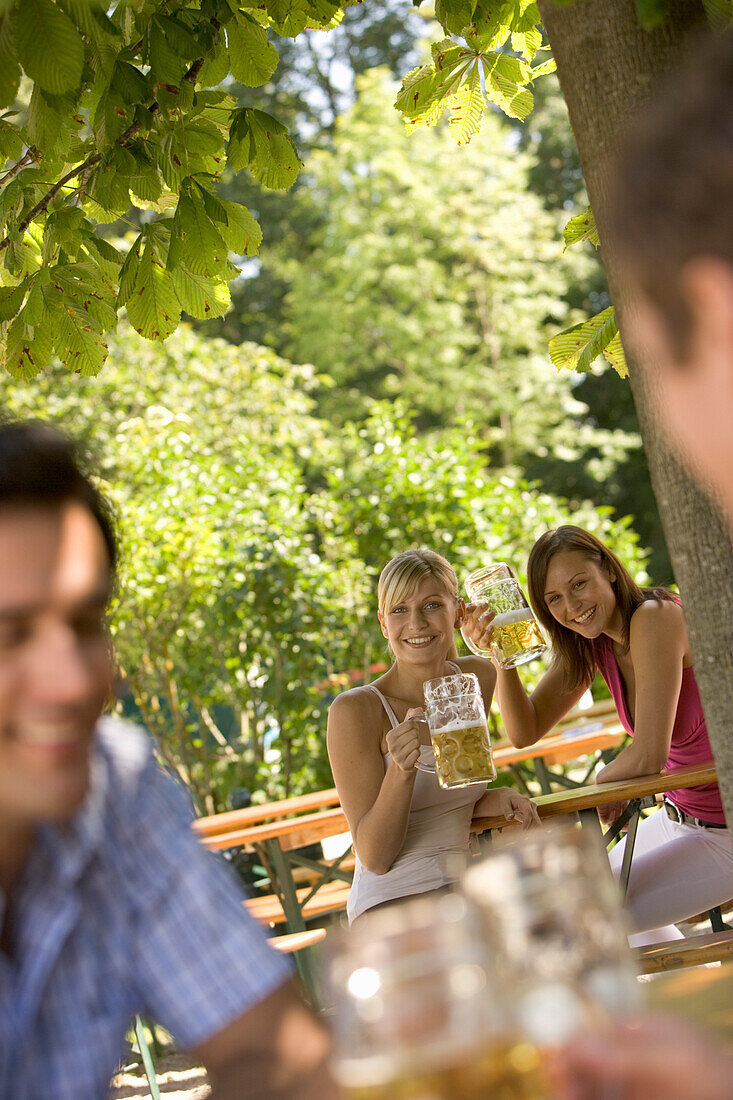 Flirt in beergarden, Starnberger See Bavaria, Germany