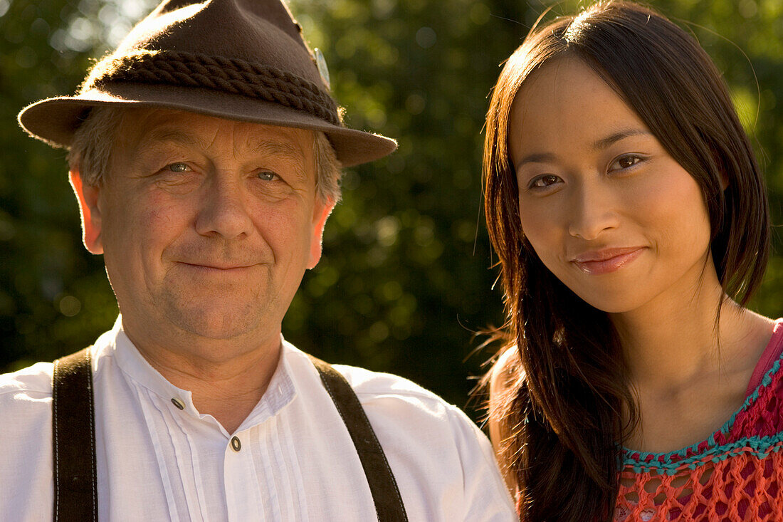 Bavarian man and asian woman, Starnberger See Bavaria, Germany