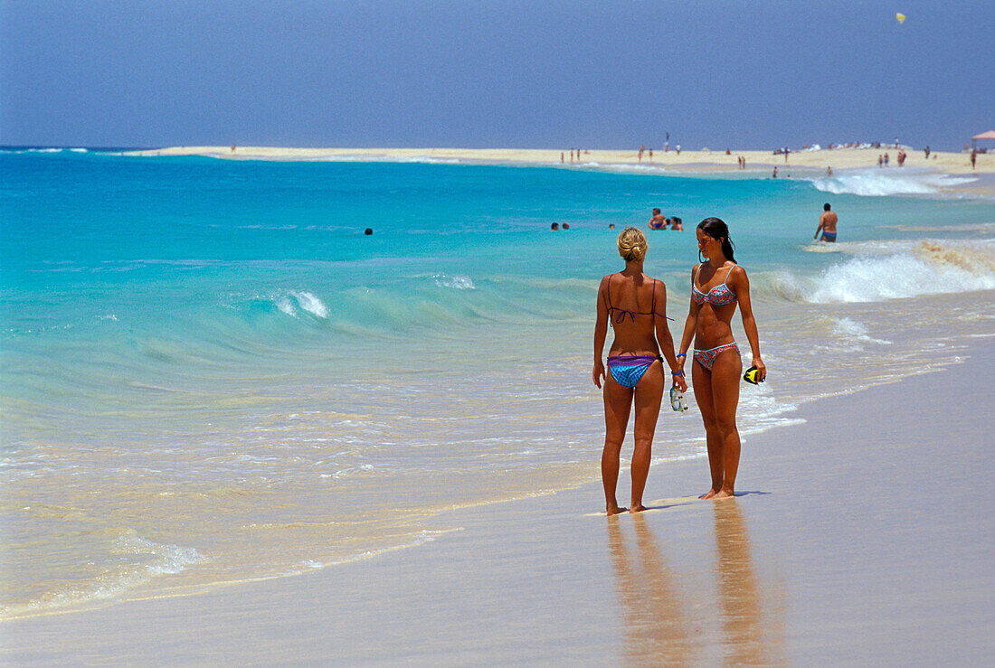 Two woman talking at beach, Beach of Santa Maria, Sal, Cape Verde Islands, Africa