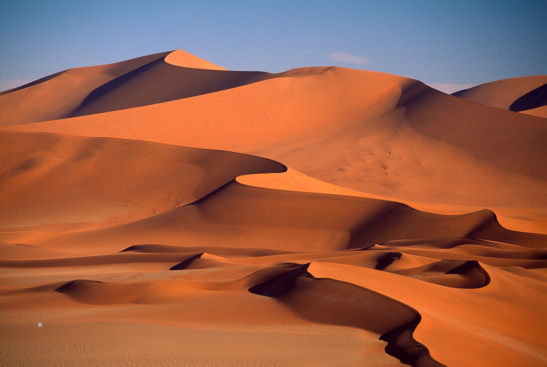 Lonesome dunes in the sunlight, Sossusvlei, Namib, Naukluft Park, Namibia, Africa