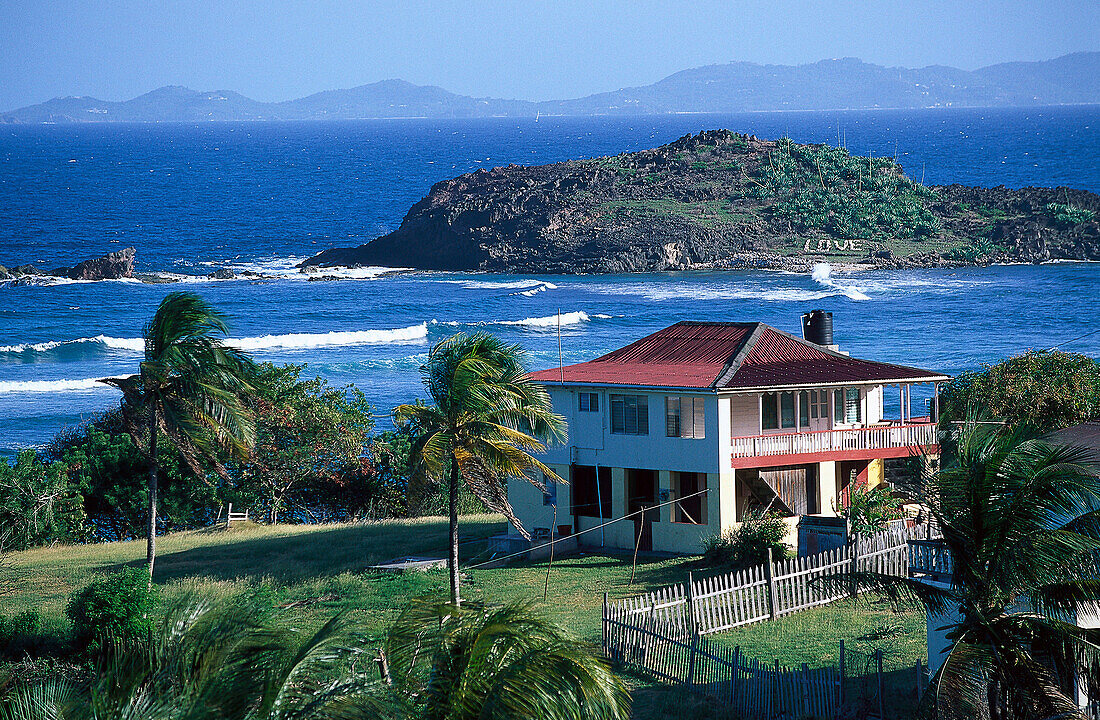 House at Friendship Bay in the sunlight, Bequia, St. Vincent, Grenadines, Caribbean, America